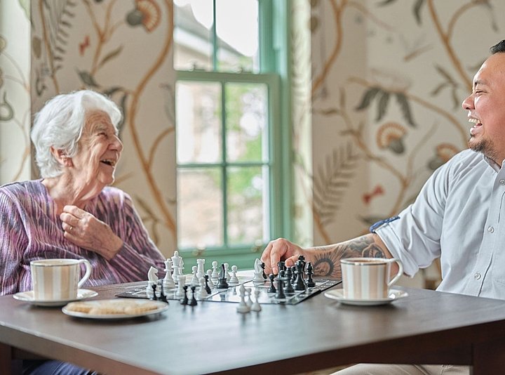 How Do Staff Support Residents' Wellbeing in Care Homes?