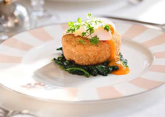 Fish cake with poached egg